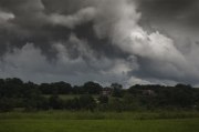 stormclouds over fields
